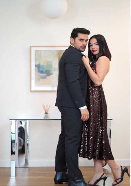 A man and a woman dressed well.